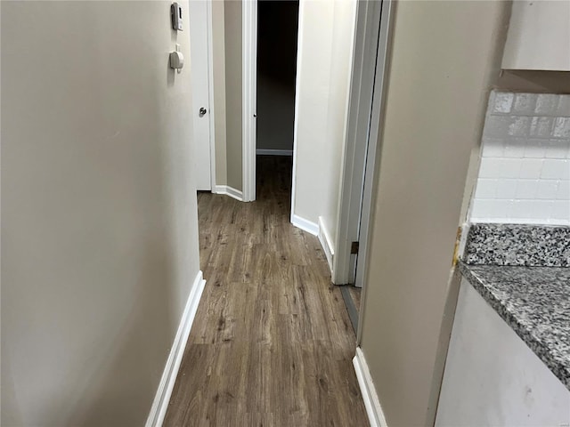 hall with light hardwood / wood-style flooring