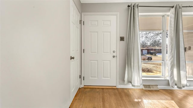 doorway with light hardwood / wood-style flooring