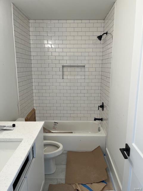 bathroom with vanity, toilet, washtub / shower combination, and tile patterned flooring