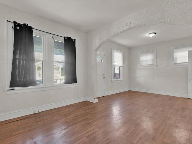 empty room featuring hardwood / wood-style flooring