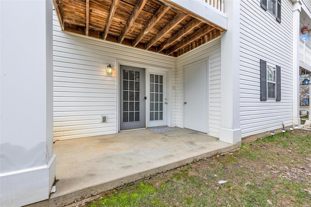 entrance to property with a patio area