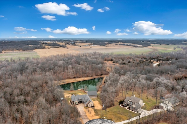 drone / aerial view with a water view and a rural view