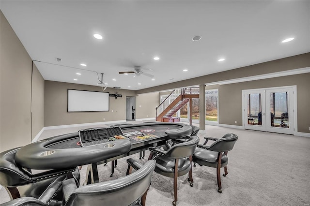 recreation room with recessed lighting, light carpet, a ceiling fan, baseboards, and french doors