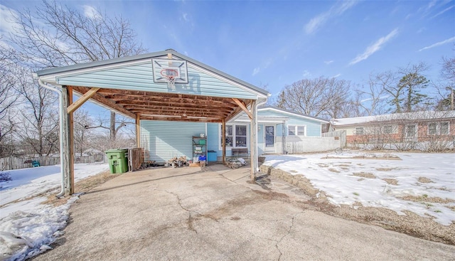 exterior space featuring a carport