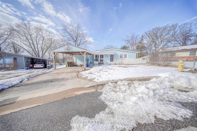 view of front of home with a carport