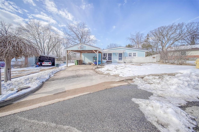 single story home with a carport