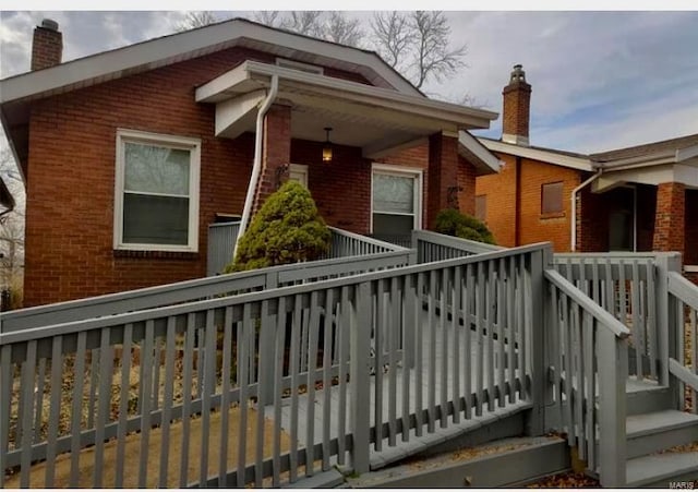 exterior space featuring a wooden deck