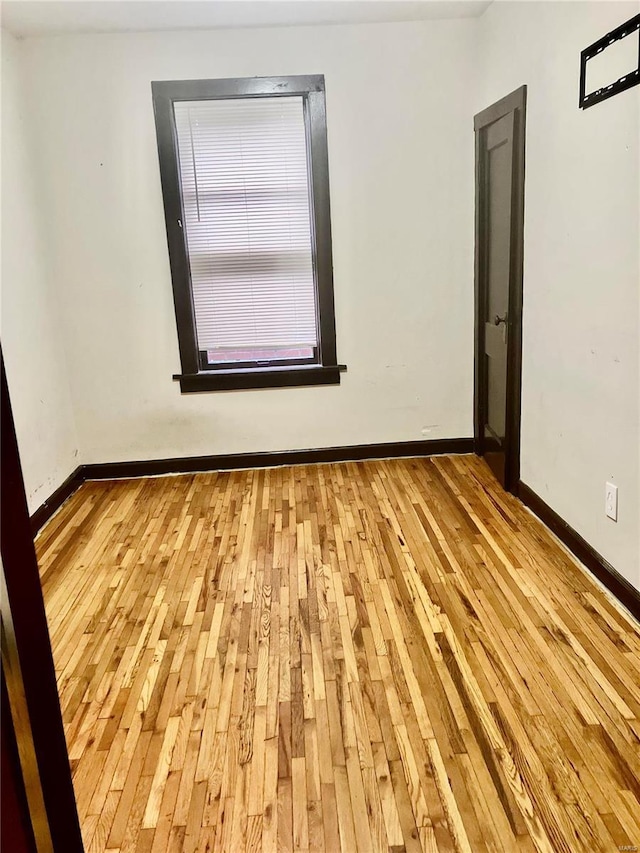 unfurnished room featuring light wood-type flooring