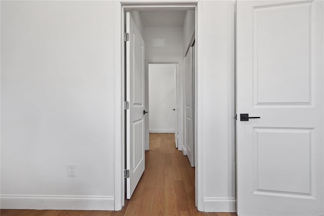 hall featuring light wood-type flooring