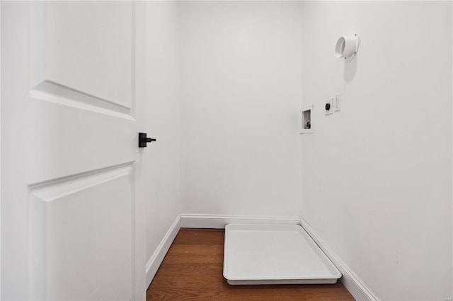 spacious closet with dark wood-type flooring