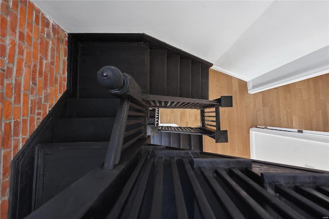 stairs with wood walls