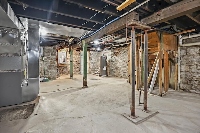 basement with electric water heater, heating unit, and electric panel