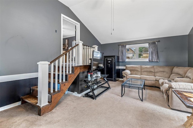 carpeted living room featuring vaulted ceiling