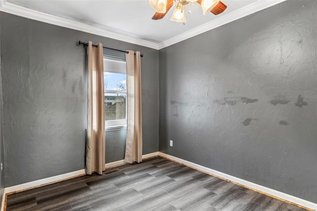 unfurnished room featuring ceiling fan, hardwood / wood-style floors, and ornamental molding