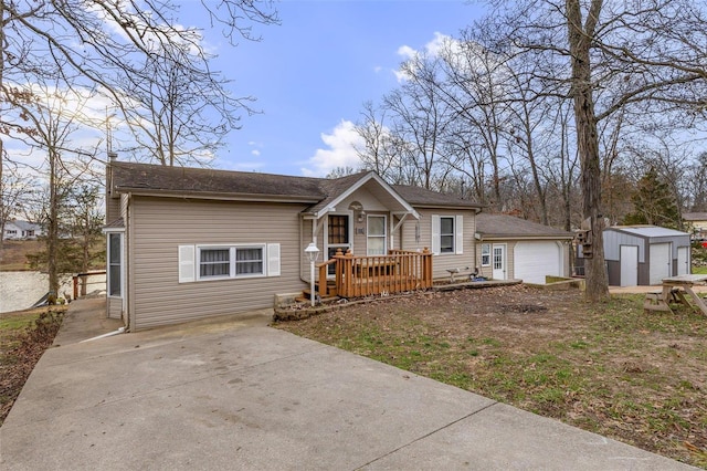 view of front of home with a shed