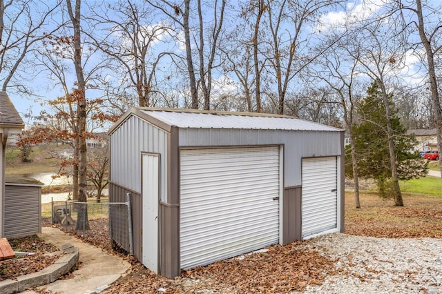 view of outbuilding with a garage