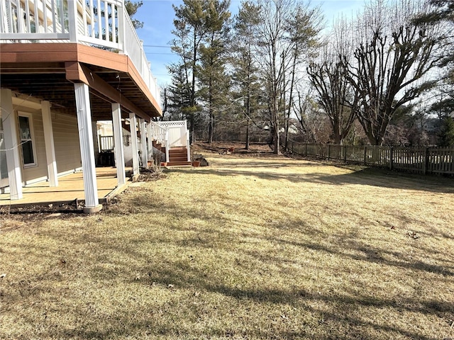 view of yard featuring a wooden deck