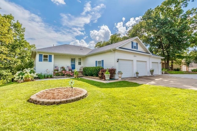 view of front facade with a garage and a front yard