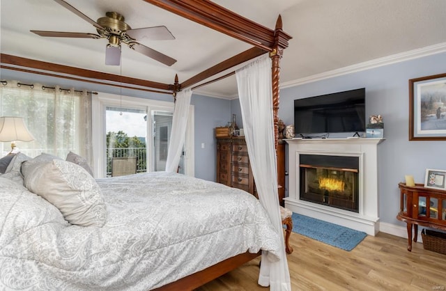 bedroom with ceiling fan, ornamental molding, access to outside, and light hardwood / wood-style flooring