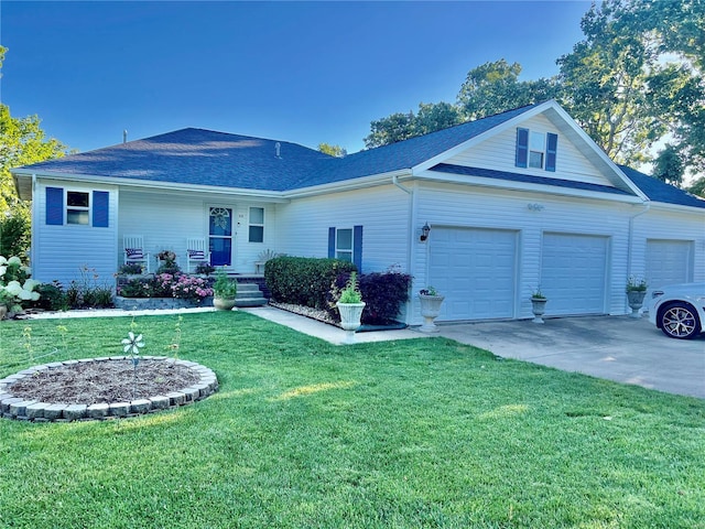 ranch-style home featuring a front lawn and a garage