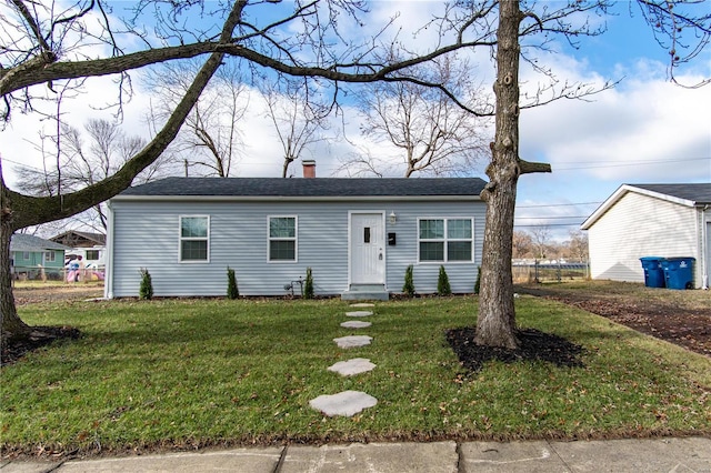 view of front of property with a front yard