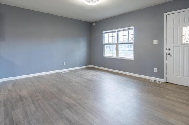 foyer entrance featuring light hardwood / wood-style floors