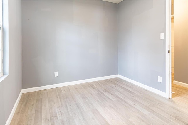 empty room featuring light hardwood / wood-style floors