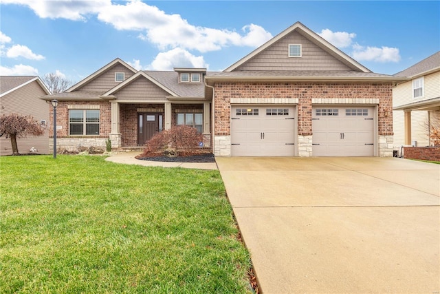 craftsman-style house featuring a front lawn and a garage