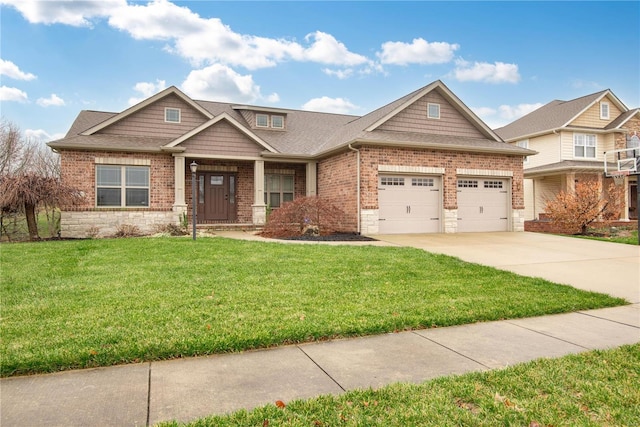 craftsman-style house with a garage and a front lawn