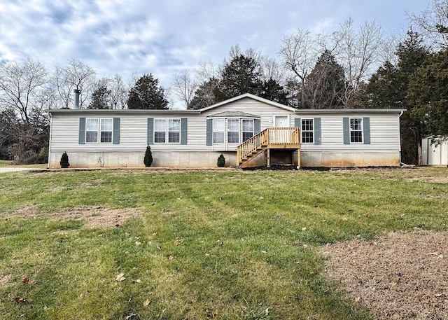 manufactured / mobile home with a front yard