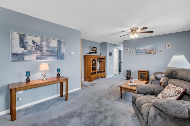 living room with carpet flooring and ceiling fan