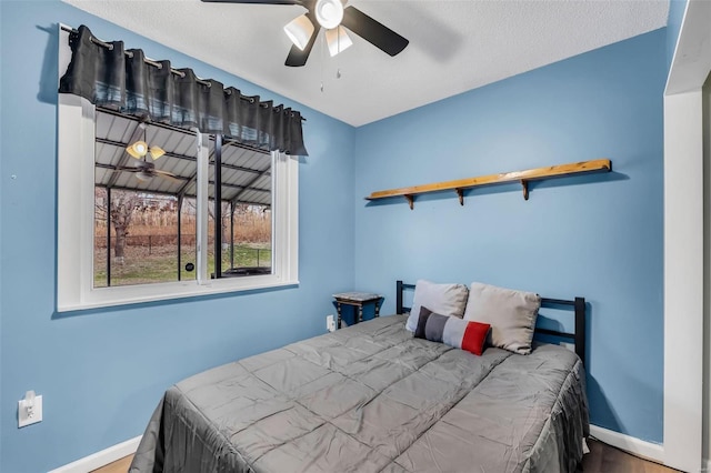 bedroom featuring ceiling fan and hardwood / wood-style floors