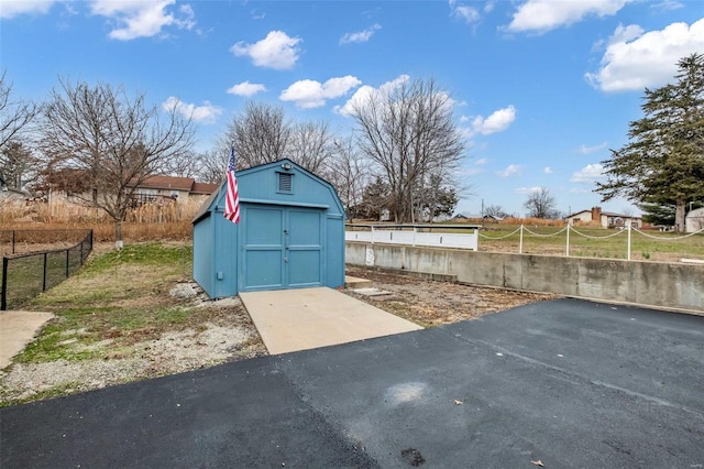 exterior space with a storage shed