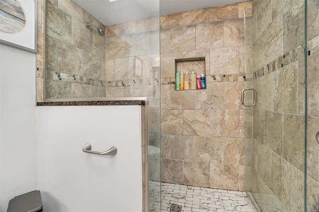 bathroom with an enclosed shower