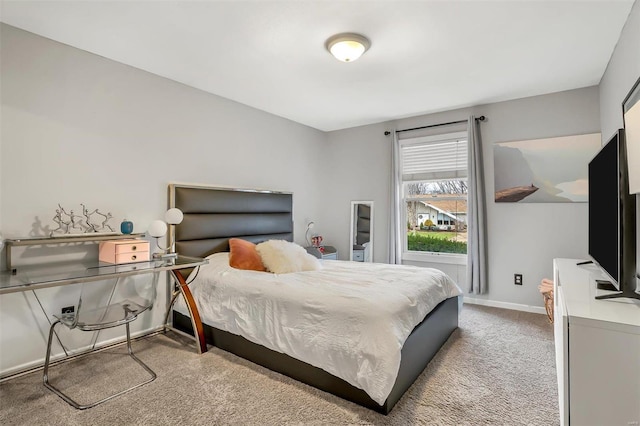 bedroom with light colored carpet