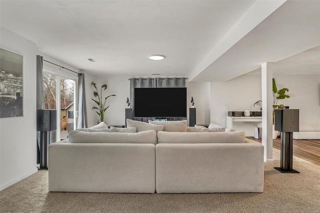 living room featuring carpet