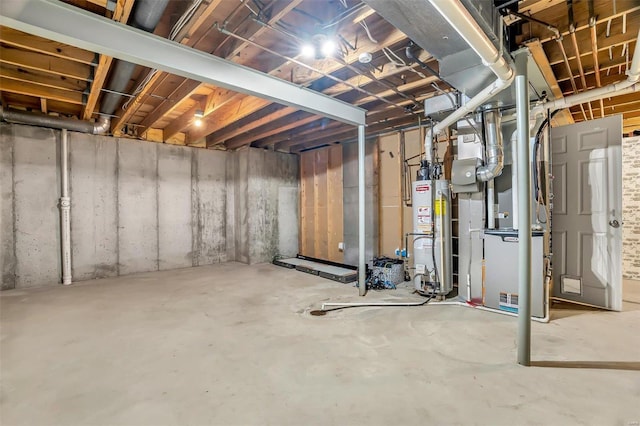 basement with gas water heater and heating unit