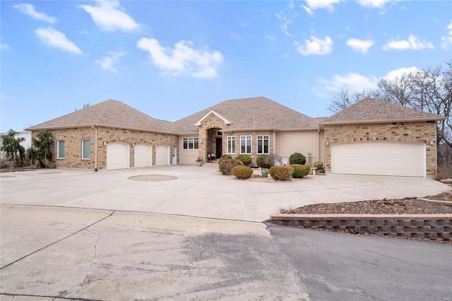 ranch-style home featuring a garage