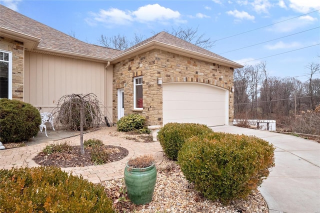 view of side of property with a garage