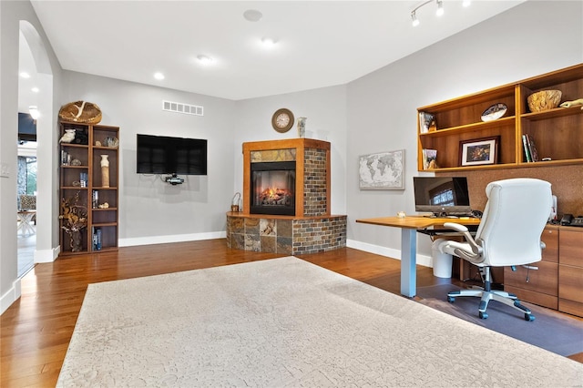 office area with dark wood-type flooring