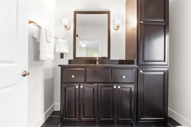 bathroom featuring tile patterned floors and vanity