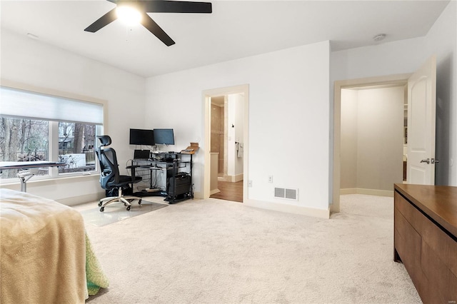 carpeted bedroom featuring ceiling fan