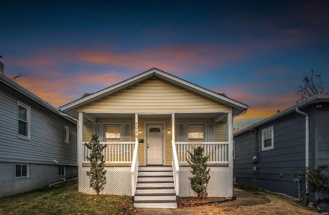 bungalow featuring covered porch