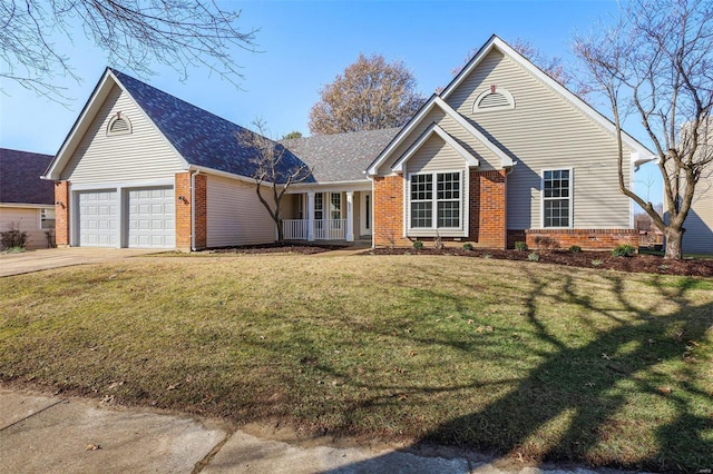 view of front of home featuring a front lawn and a garage