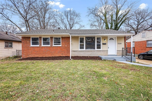 single story home featuring a front yard