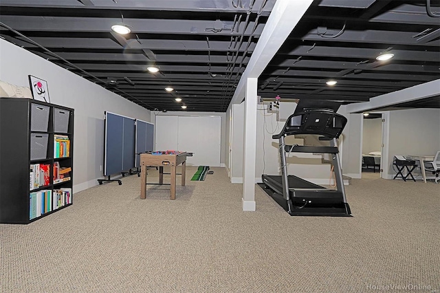 workout room featuring carpet floors