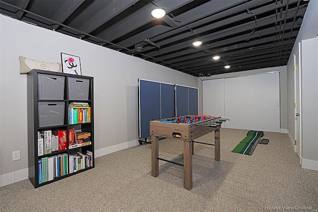 recreation room featuring carpet flooring