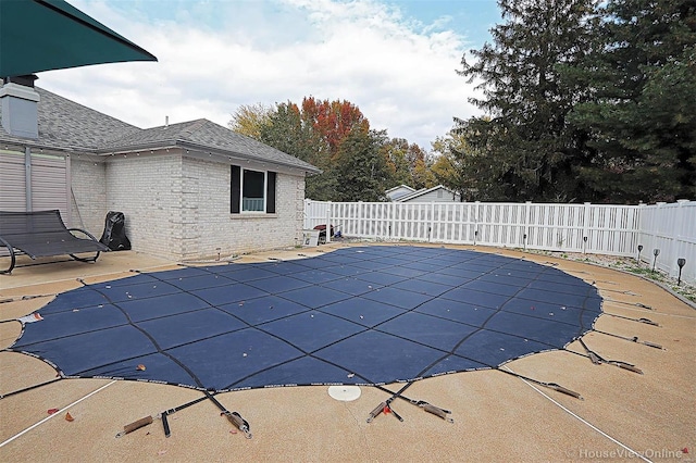 view of pool featuring a patio area