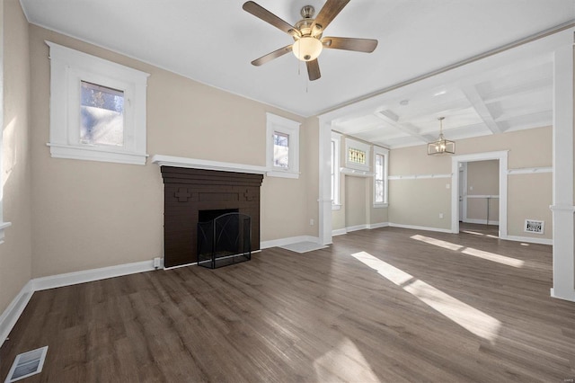 unfurnished living room with ceiling fan, coffered ceiling, beamed ceiling, wood-type flooring, and a fireplace