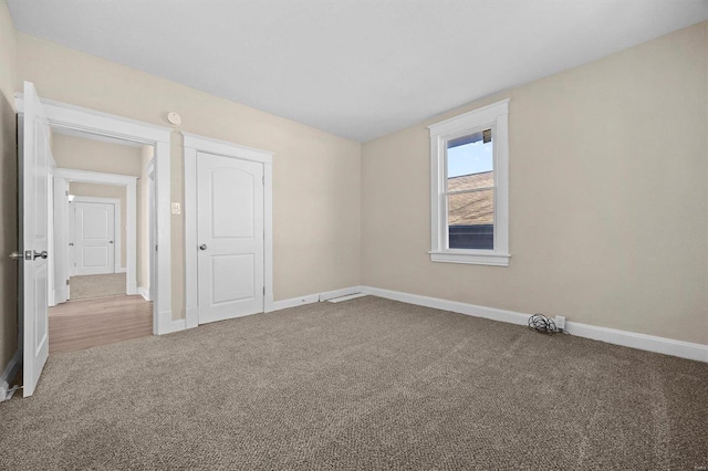 view of carpeted spare room